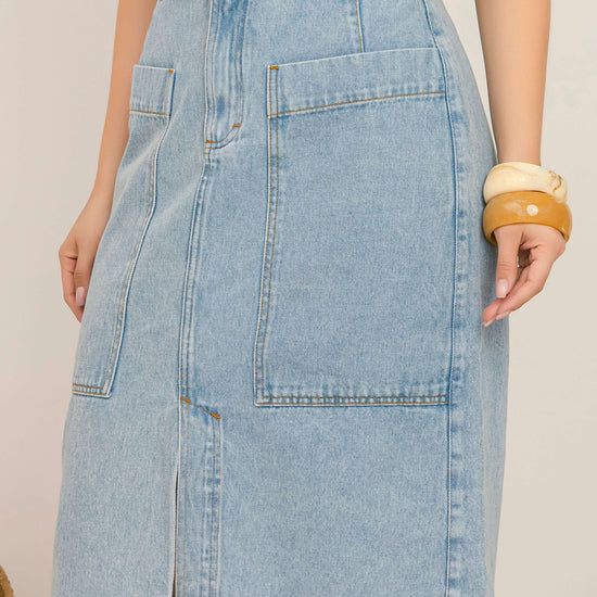 Saia Laís – Jeans Marmorizado Utilitário com Elegância 